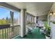 This cozy balcony has comfortable seating, a small table, and a lovely outdoor view at 1404 Whitehall Dr # C, Longmont, CO 80504