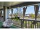 This balcony features cozy seating and relaxing outdoor views at 1404 Whitehall Dr # C, Longmont, CO 80504