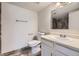Bathroom featuring tile floor, toilet, sink with vanity and tiled shower at 1758 S Ensenada St, Aurora, CO 80017