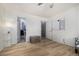 Bright bedroom features wood floors, closet, and neutral paint at 2650 S Vaughn Way # D, Aurora, CO 80014