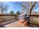 Outdoor deck featuring an 'It's BBQ Time' covered grill, perfect for entertaining at 2650 S Vaughn Way # D, Aurora, CO 80014