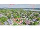 Aerial view of property in a neighborhood near Downtown and Sloan's Lake, outlined in red, surrounded by lush trees at 2809 Yates St, Denver, CO 80212