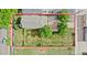 Aerial view of property with large grassy backyard, measuring 62.5 ft x 125 ft at 2809 Yates St, Denver, CO 80212