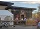Outside patio seating at brewery with people socializing; a bike is parked nearby at 2809 Yates St, Denver, CO 80212