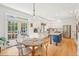 Charming kitchen with an island, stainless steel appliances and a breakfast nook at 742 Norwich Ct, Castle Pines, CO 80108