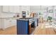Open concept kitchen with granite countertops, stainless appliances, and a center island with a cooktop at 742 Norwich Ct, Castle Pines, CO 80108