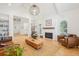 Cozy living room with a fireplace and a comfortable seating area at 742 Norwich Ct, Castle Pines, CO 80108