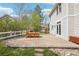 Paver patio and backyard with a privacy fence and well-maintained landscaping, ideal for outdoor entertaining at 742 Norwich Ct, Castle Pines, CO 80108