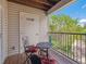 Cozy balcony with wrought iron table and chairs offering outdoor space at 12348 W Dorado Pl # 204, Littleton, CO 80127