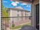 Balcony view of a multi-story building featuring stone and siding at 12348 W Dorado Pl # 204, Littleton, CO 80127