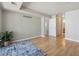 Bright and airy bedroom featuring wood floors and ample closet space at 12348 W Dorado Pl # 204, Littleton, CO 80127