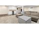 Finished basement with a kitchenette featuring new cabinets and stainless steel appliances at 452 Deframe Ct, Golden, CO 80401