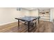 Basement game room with a ping pong table at 452 Deframe Ct, Golden, CO 80401