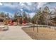 Neighborhood playground with slides and a swing set offering recreational space for  at 452 Deframe Ct, Golden, CO 80401