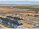 Planned community aerial showcasing the layout of residential areas and infrastructure at 608 N Bersshine Ct, Watkins, CO 80137