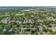 Scenic aerial shot of a neighborhood with mature trees, green space, and an outlined property at 4634 W Tufts Cir, Denver, CO 80236