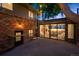 Backyard deck with entrance to brick house at 4634 W Tufts Cir, Denver, CO 80236