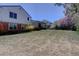 Spacious backyard featuring a covered patio area and mature landscaping at 5759 E Geddes Cir, Centennial, CO 80112
