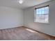Bright bedroom featuring a large window that brings in lots of natural light at 5759 E Geddes Cir, Centennial, CO 80112