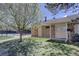 Community building with a brick exterior and well-maintained landscaping at 5759 E Geddes Cir, Centennial, CO 80112