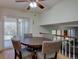 Eat in dining room with ceiling fan and sliding doors to a screened in patio at 5759 E Geddes Cir, Centennial, CO 80112