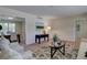 Relaxing living room with views of dining area, neutral color palette, and modern decor at 5759 E Geddes Cir, Centennial, CO 80112