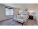 Bedroom with queen size bed, side tables and lamps at 5759 E Geddes Cir, Centennial, CO 80112
