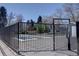 Community pool area with a gated entrance for safety and security at 5759 E Geddes Cir, Centennial, CO 80112