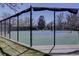 Well-maintained community tennis court with fencing and a paved surround at 5759 E Geddes Cir, Centennial, CO 80112