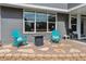 Backyard patio area featuring comfortable seating and a fire pit at 762 Hughes Ln, Highlands Ranch, CO 80126