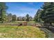 Lush backyard with a wood fence at 762 Hughes Ln, Highlands Ranch, CO 80126