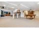 Open basement layout featuring a pool table, bar area, and plenty of space for entertaining at 762 Hughes Ln, Highlands Ranch, CO 80126