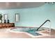 Indoor hot tub with calming light blue walls at 750 S Clinton St # 6B, Denver, CO 80247