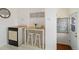 Bright kitchen with a breakfast nook and charming decor elements at 6900 Avrum Dr, Denver, CO 80221