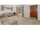 Bright living room with plush sofas, large windows, and a classic design at 6900 Avrum Dr, Denver, CO 80221