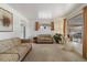 Spacious living room with neutral decor and ample natural light at 6900 Avrum Dr, Denver, CO 80221
