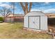 A backyard shed with double doors at 6900 Avrum Dr, Denver, CO 80221