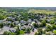 Bird's eye view of property nestled among lush trees within a well-planned community at 11585 Decatur St # B, Denver, CO 80234