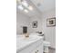 Powder room with white vanity and neutral paint at 11585 Decatur St # B, Denver, CO 80234