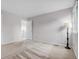 Empty carpeted bedroom featuring neutral paint and lots of light at 11585 Decatur St # B, Denver, CO 80234