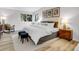 Bedroom featuring a large bed, plush bedding, and ample natural light at 11585 Decatur St # B, Denver, CO 80234