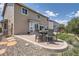 Backyard patio features comfortable outdoor dining with ample seating at 6511 Shea Pl, Highlands Ranch, CO 80130