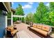 Spacious outdoor deck with comfortable seating and a pergola, perfect for entertaining and relaxation at 18967 W 54Th Ln, Golden, CO 80403