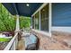Cozy front porch with a comfortable bench, providing a perfect spot to enjoy the outdoors and neighborhood views at 18967 W 54Th Ln, Golden, CO 80403