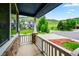 Cozy front porch with stone accents offering beautiful views of the neighborhood and surrounding hills at 18967 W 54Th Ln, Golden, CO 80403