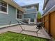 Relaxing backyard with hammock, grill, firepit, and privacy fence at 5445 Verbena St, Denver, CO 80238
