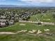 Community aerial view showcasing lush golf course, mature trees, and well-maintained landscaping at 9548 La Quinta Dr, Lone Tree, CO 80124
