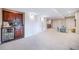 Finished basement with a wet bar, a play area, and plenty of space for entertaining at 9548 La Quinta Dr, Lone Tree, CO 80124