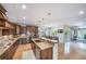 Open concept kitchen, center island, and stainless steel appliances at 9548 La Quinta Dr, Lone Tree, CO 80124