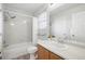 Bathroom with bathtub, shower, toilet and light-colored vanity with neutral counter top at 4674 Winona Pl, Broomfield, CO 80020